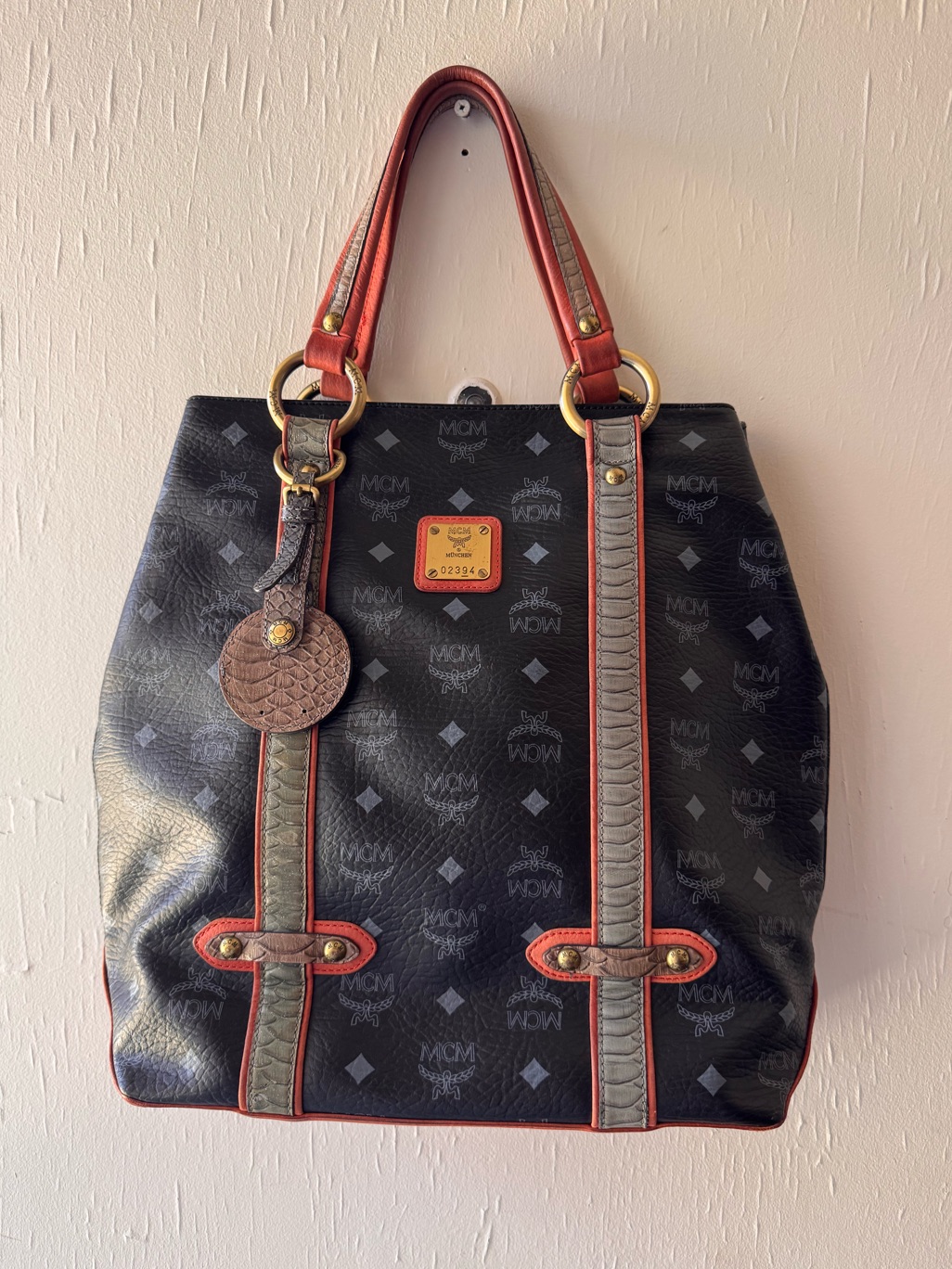 Mcm Black Monogram Tote With Red Trim And Gray Straps
